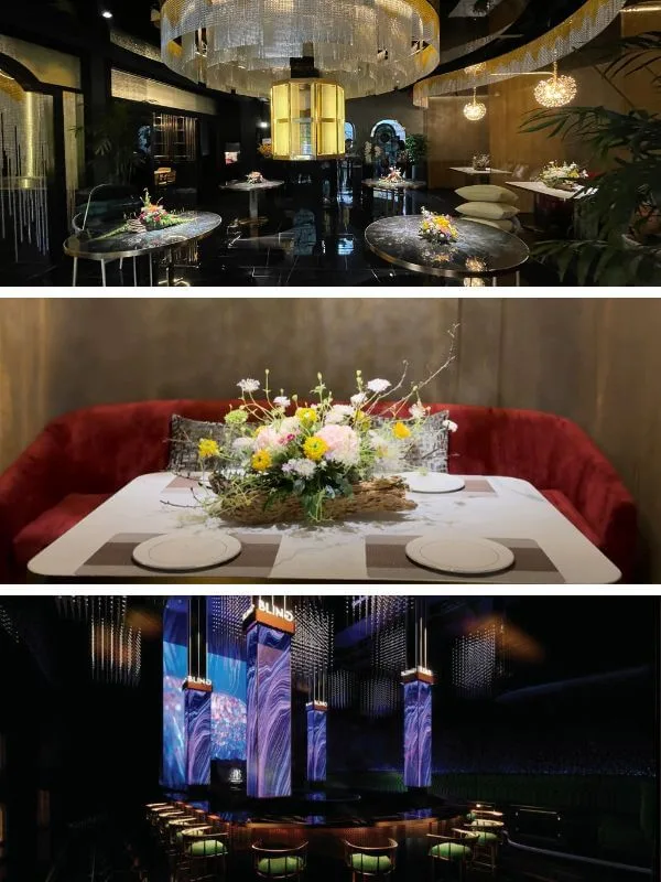 Bling Bling Club内のクリスタルシャンデリア、赤いベルベットチェアのVIPテーブル、ラウンジバーを備えたEm-Restaurantのダイニングルーム