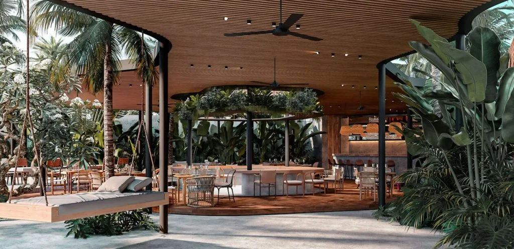 Quầy bar The Brix dưới trần lam gỗ cong với giường xích đu và cây nhiệt đới